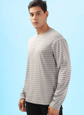 Side view of a men's long sleeve T-shirt made from the 'Maddy' sewing pattern. Designed for casual wear with a relaxed silhouette.