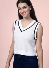 Smiling model wearing the 'Nadine' sweater vest, a chic and comfortable sewing pattern. Ideal for crafting a stylish and sporty wardrobe staple.