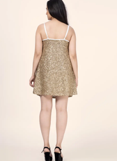 Back view of the 'Oriole' party mini dress sewing pattern, highlighting the simple yet elegant design with thin straps and a relaxed fit.
