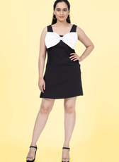 a woman in a black and white dress made with Phoebe big bow dress sewing pattern