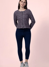 Model wearing the 'Liza' cardigan, a fitted button-up design with long sleeves, ideal for layering. This sewing pattern is perfect for creating a stylish and versatile outerwear piece.