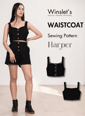 Women's black crop top with sweetheart neckline and button down front, styled with high-waisted shorts