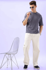 Full-body shot of a model in the Men's Oversized T-shirt 'Archie' paired with relaxed-fit pants, demonstrating a modern and comfortable outfit.