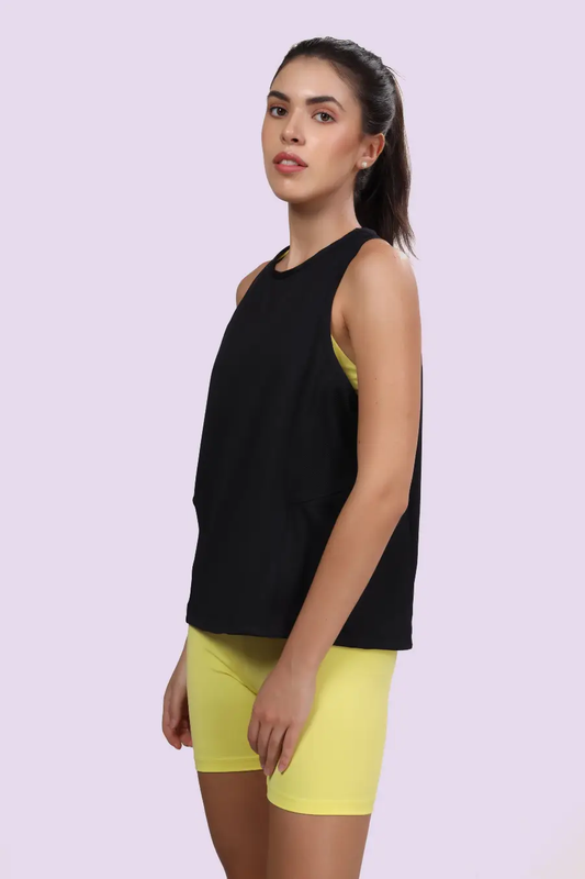 Side view of a black sleeveless tank top made using the 'Tracy' sewing pattern. Relaxed fit, high neckline, perfect for workouts or casual wear.