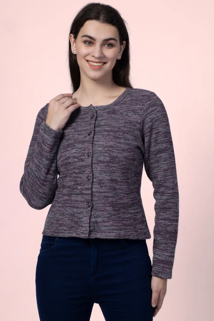 Model gently touching the 'Liza' cardigan, highlighting its soft fabric and flattering fit. A must-have sewing pattern for DIY fashion enthusiasts.