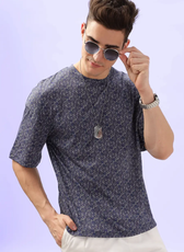 Close-up of the Men's Oversized T-shirt 'Archie' with a model adjusting sunglasses, highlighting the soft fabric and relaxed fit.