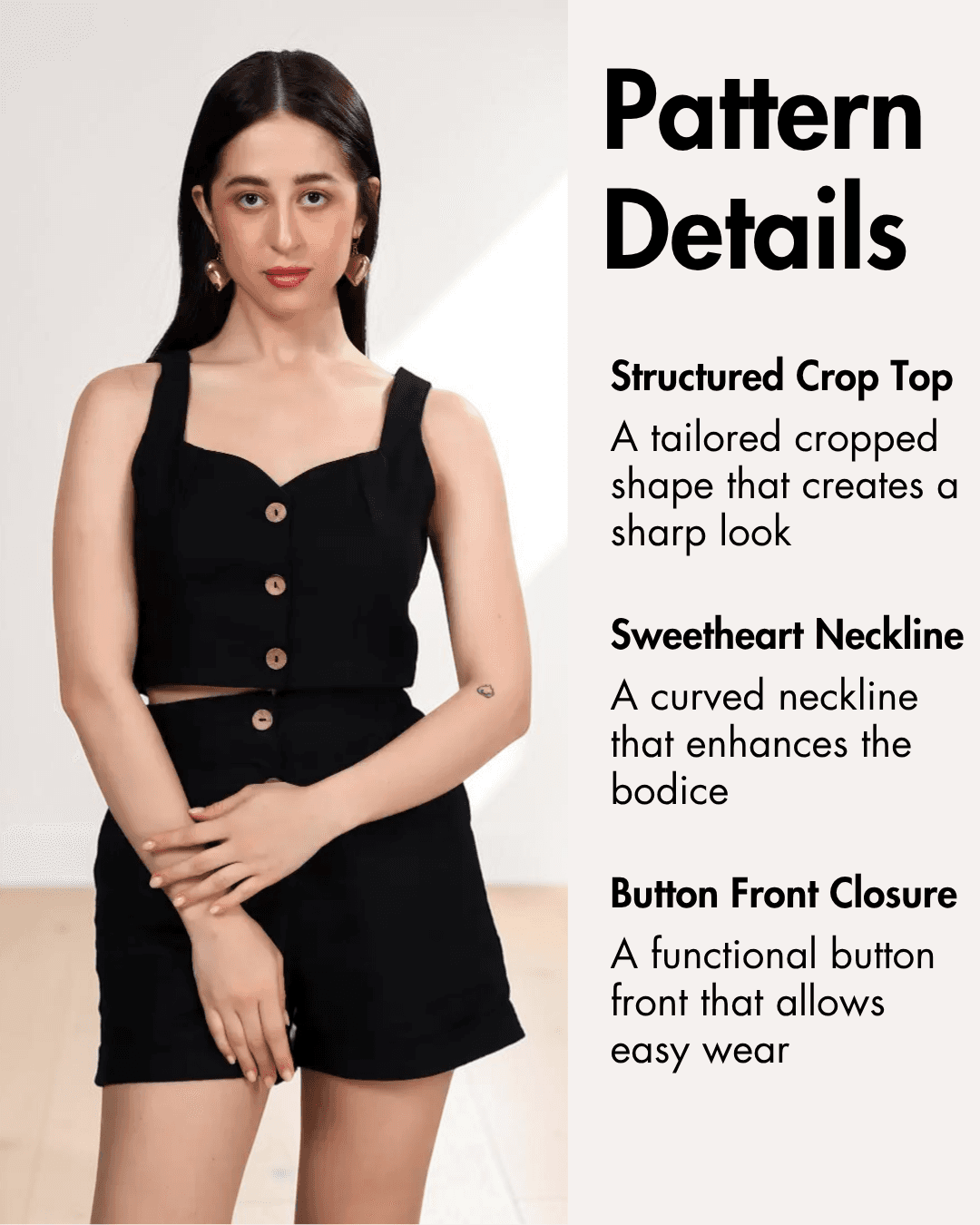 Pattern details of black crop top with structured shape, sweetheart neckline, and button front closure