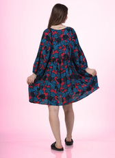Back view of a model wearing the 'Ivy' V-neck dress sewed with Winslet's patterns