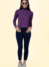 Model wearing a purple turtleneck T-shirt made using the 'Diana' sewing pattern. A fitted long-sleeve design for stylish layering.