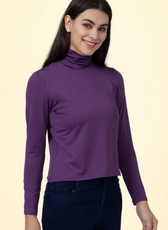Model smiling in a purple turtleneck T-shirt made from the 'Diana' sewing pattern. A chic and comfortable wardrobe essential.