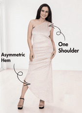 Model wearing one shoulder ruched maxi dress with asymmetric hem, front view