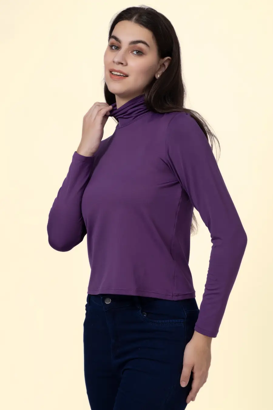 Side view of the 'Diana' turtleneck T-shirt, highlighting the snug fit and elegant neckline. Ideal for layering or standalone wear.