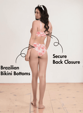 Model in pink floral bikini with structured balconette top and Brazilian bottoms