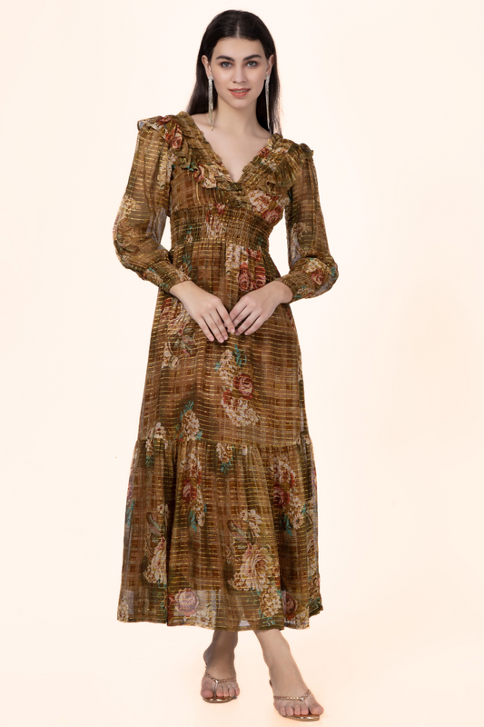 Model wearing a vintage-inspired Daisy Maxi Dress with a floral print, V-neckline, and shirred waist. Perfect for sewing enthusiasts.