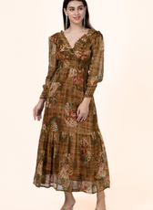 Side view of the Daisy Maxi Dress showcasing its elegant tiered skirt, ruffled neckline, and long sleeves. Ideal for DIY fashion projects.