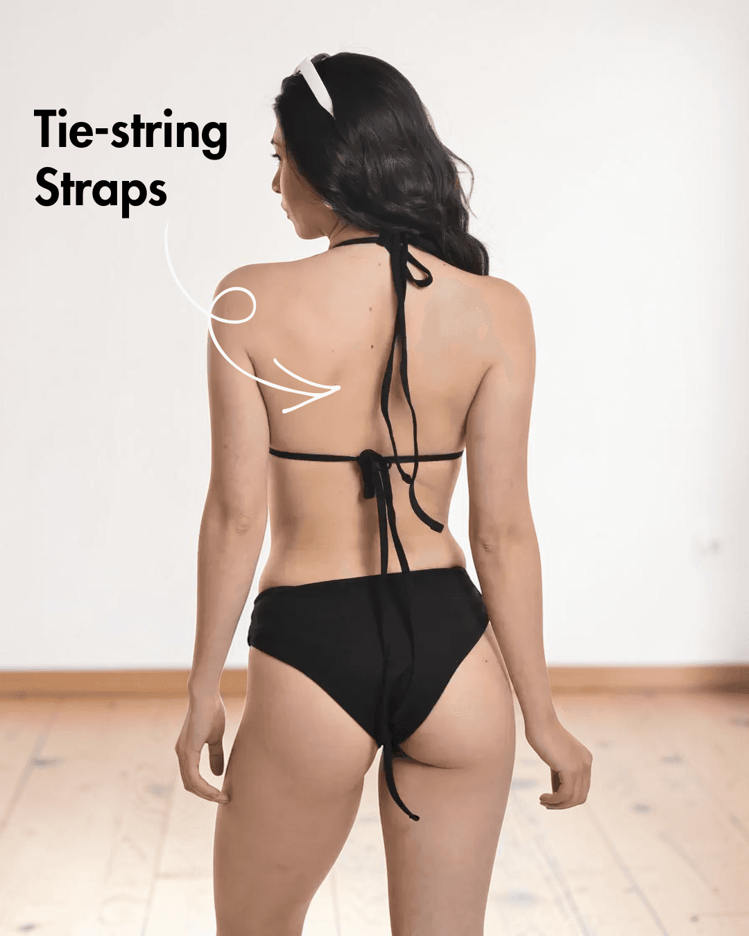 Back view of Close-up of classic triangle bikini cups with tie-string straps