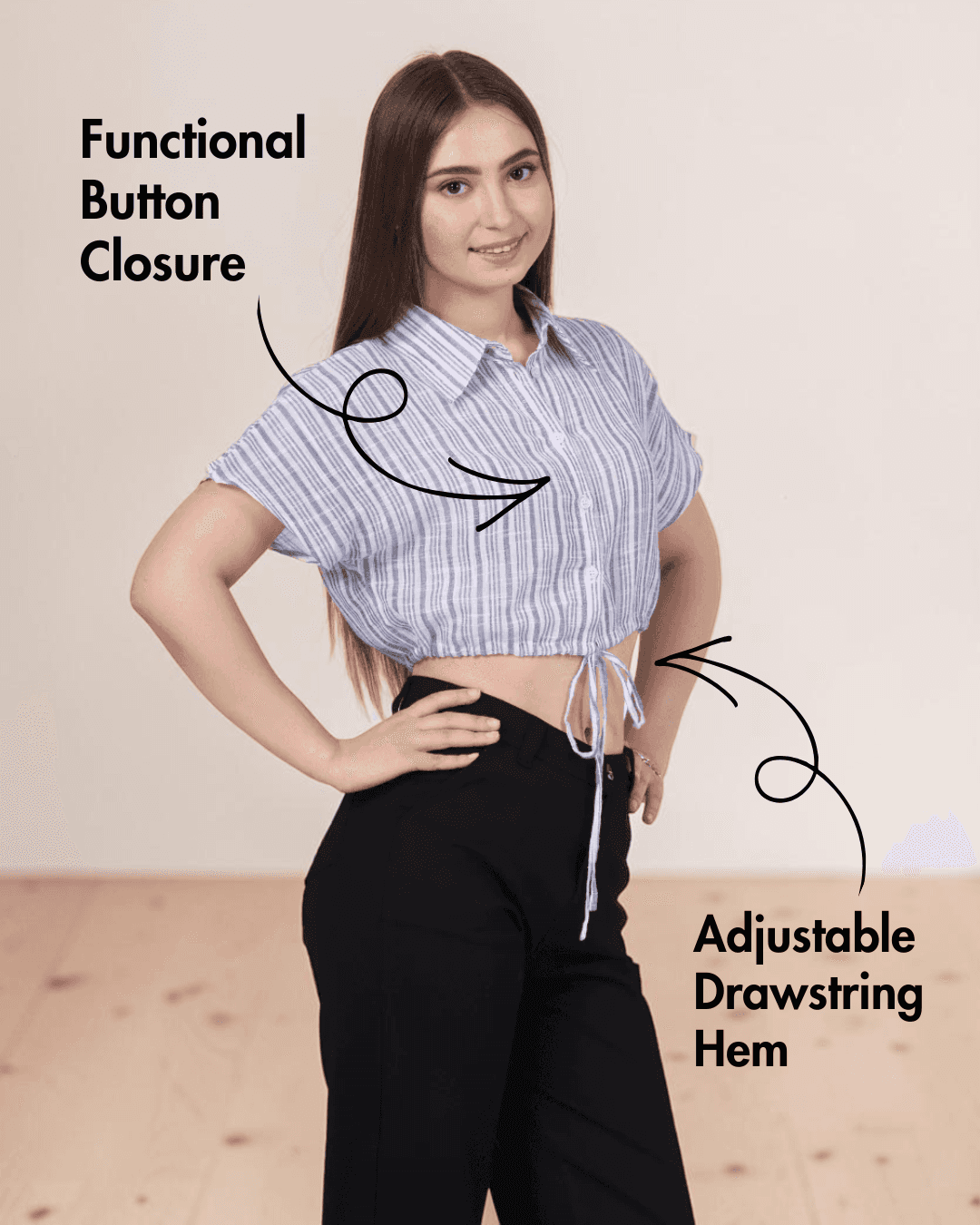 Model showcasing blue striped cropped shirt with adjustable drawstring hem