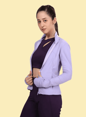 Model wearing the Venus sports jacket, showcasing its slim-fit design, full zip, and thumbhole cuffs for a stylish and functional look.