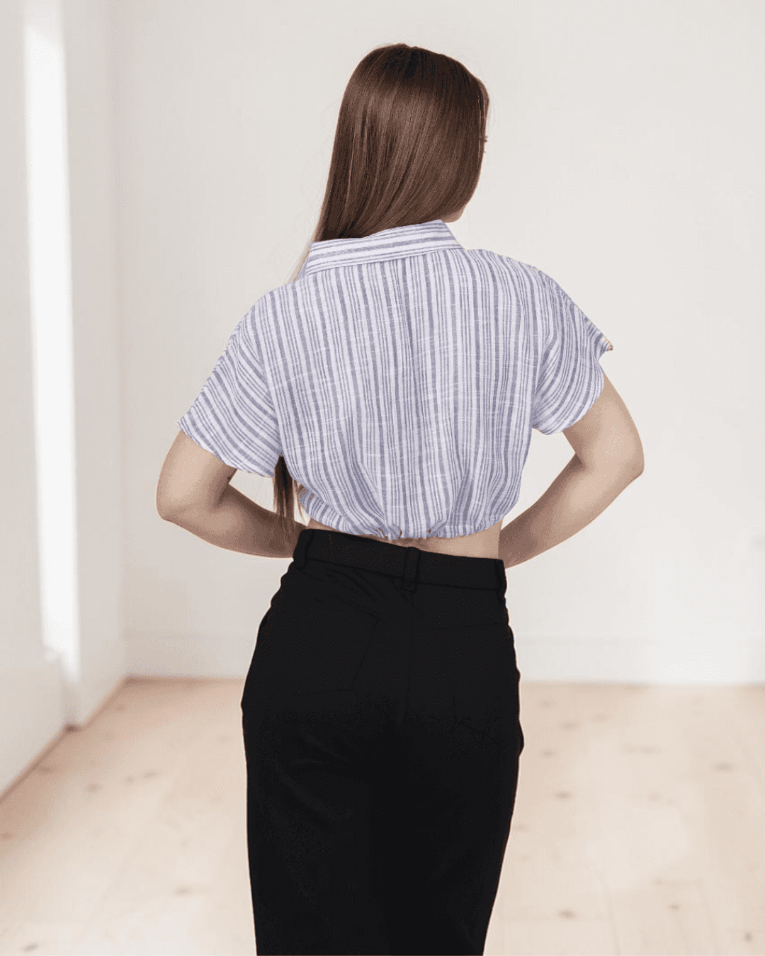Close-up of blue striped shirt with button-up front and short sleeves