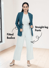 Woman wearing a fitted jumpsuit with back zipper and wide-leg pants for formal wear