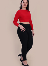 Model in Stella Long Sleeve Crop Top in red, styled with black jeans and heels. A chic and simple sewing pattern for a modern wardrobe.