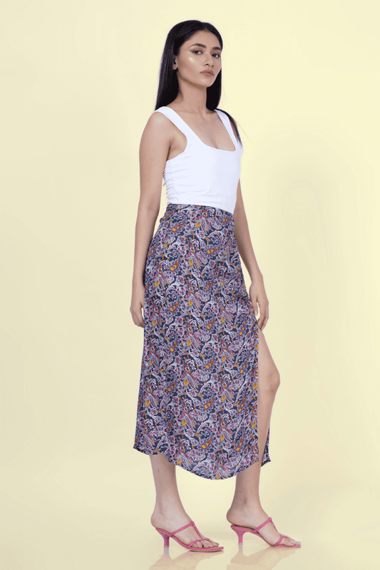 Side view of the 'Dahlia' midi skirt sewing pattern, showcasing its elegant drape and high slit. Ideal for DIY fashion enthusiasts.