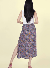 Back view of the 'Dahlia' side slit midi skirt, highlighting its flowy silhouette. A perfect sewing project for beginners and fashion lovers.