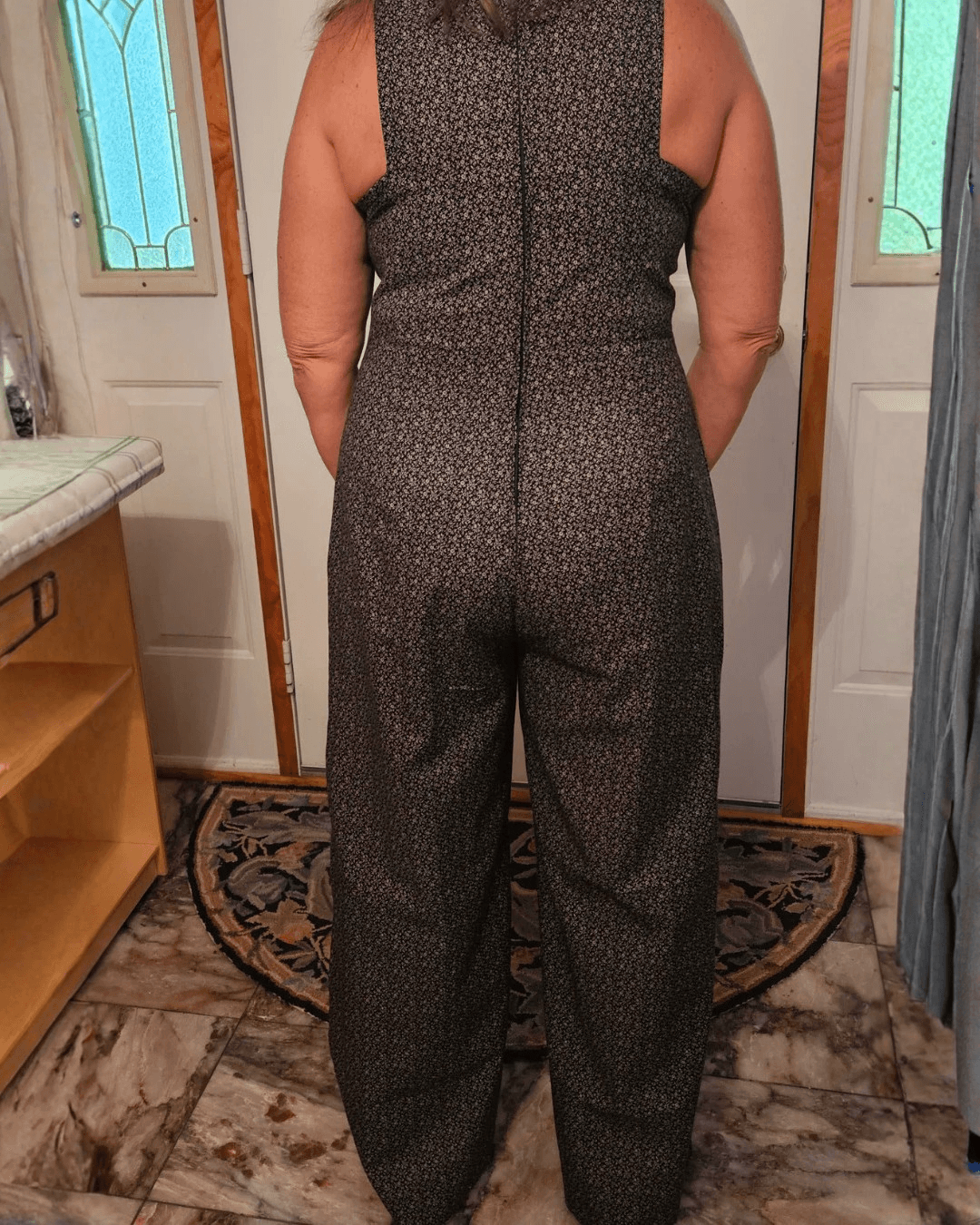 Close-up of back zipper detail on women's formal jumpsuit 'Vivian'
