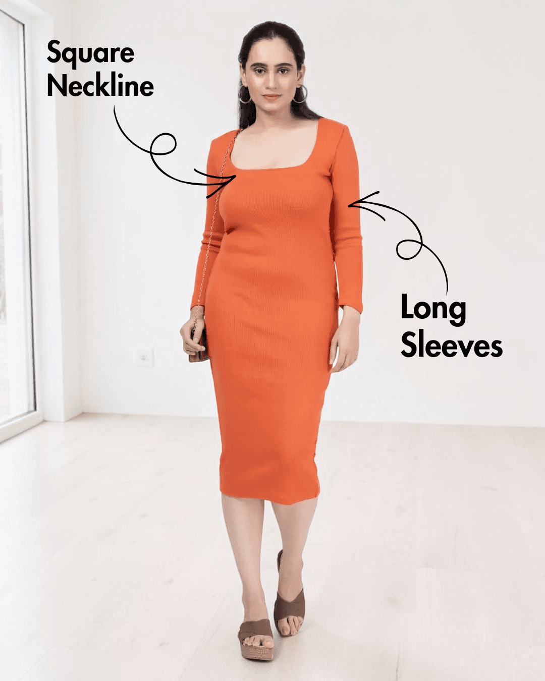 Model wearing orange midi dress with square neckline and long sleeves