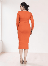 Back view of orange midi dress with square neckline and long sleeves