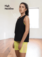 Model wearing black sleeveless tank top with high neckline, paired with yellow shorts, showcasing 'Tracy' sewing pattern for activewear
