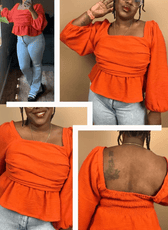 Women's orange peplum top sewing pattern with gathered hem and puff long sleeves
