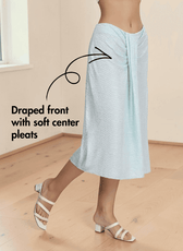 Close-up of draped front with soft center pleats and invisible zipper