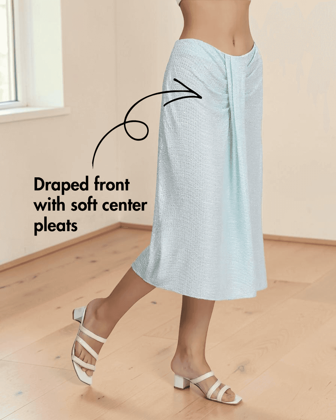 Close-up of draped front with soft center pleats and invisible zipper