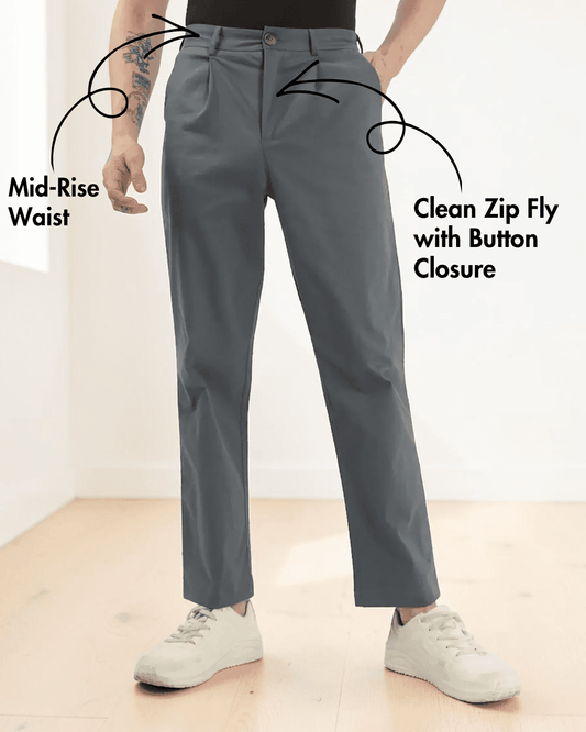 Close-up of men's gray formal trousers sewing pattern showing mid-rise waist, front pleats, and belt loops