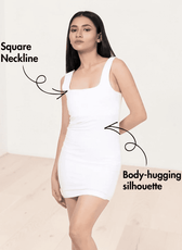 Front view of model wearing white sleeveless mini dress with square neckline