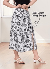 Close-up of floral twist knot midi skirt with slit