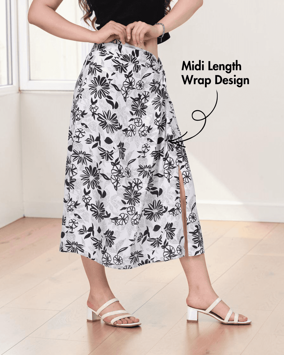 Close-up of floral twist knot midi skirt with slit