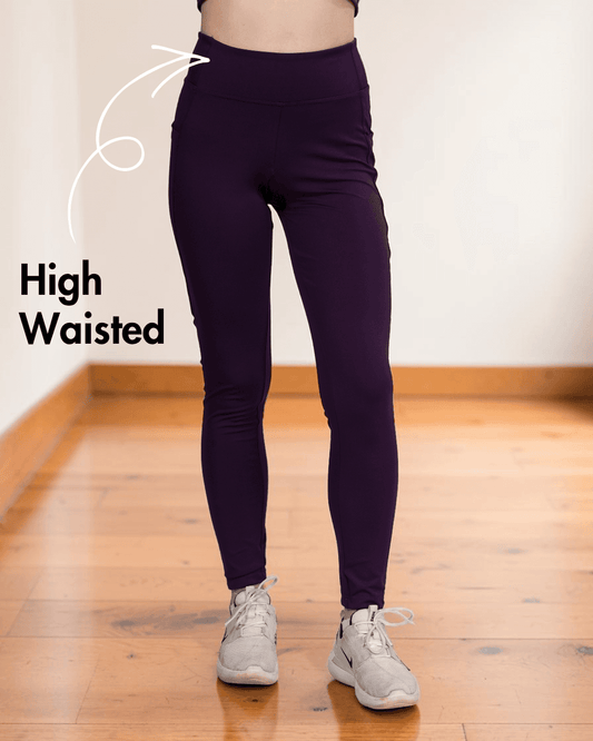 Close-up of purple high-waisted leggings with supportive waistband