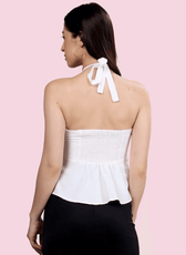 Back view of the 'Alice' halter top, featuring a smocked panel and tie-back halter straps. A versatile sewing pattern for stylish handmade tops.