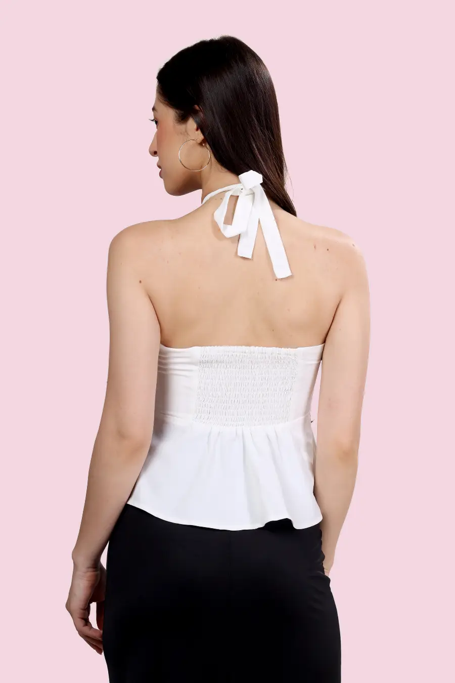 Back view of the 'Alice' halter top, featuring a smocked panel and tie-back halter straps. A versatile sewing pattern for stylish handmade tops.