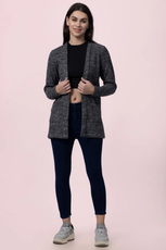 Front view of the 'Nora' long cardigan, styled with a casual outfit. Features a relaxed fit, long sleeves, and front pockets for added functionality.