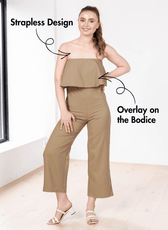 Model wearing beige strapless jumpsuit sewing pattern with overlay and straight-leg design