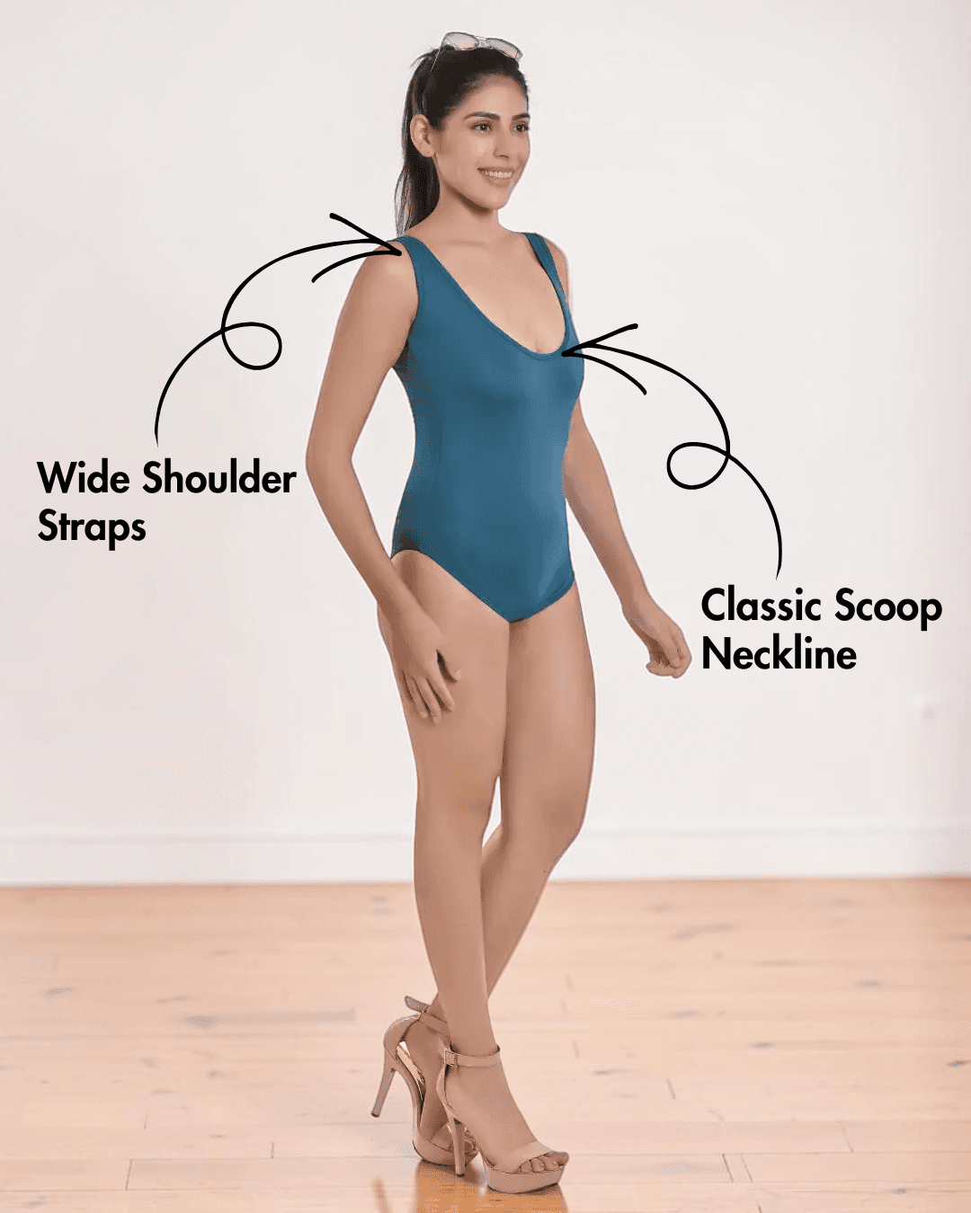 Model wearing blue Bodysuit Sewing Pattern 'Gabby' with wide shoulder straps and scoop neckline