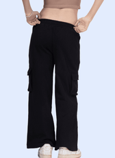 Back view of Y2K sweatpants from the 'Maddie' sewing pattern, highlighting the elastic waistband and cargo pocket details for a retro aesthetic.