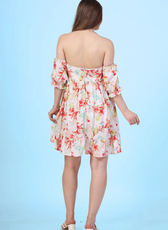 Back View of Model wearing an off shoulder dress, sewed with winslet's patterns
