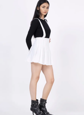 Side view of model wearing a suspender skirt sewed with Winslet's patterns
