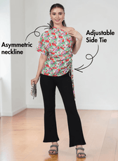 Model wearing floral one shoulder kimono top with adjustable side tie, black pants, and heels, sewing pattern for women