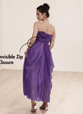 Purple strapless gown with ankle-length slit and invisible zip closure, back view