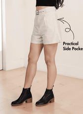 Side view of High waisted shorts sewing pattern 'Bailey' with front pleats and wide leg hem